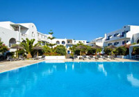 Mediterranean White santorinipoolandhotelbuildingjpg.jpg