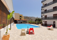 Outdoor pool. Antiko Hotel Apartments...