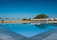 Pool with sunbeds at Vincci EverEden in Athens Riviera