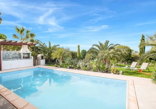 Pool Area At Palm Villas